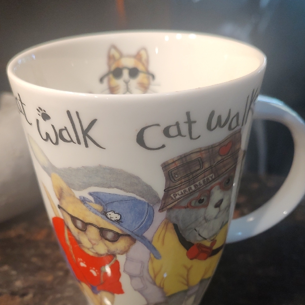 Ceramic Mug with Playful Cat Design